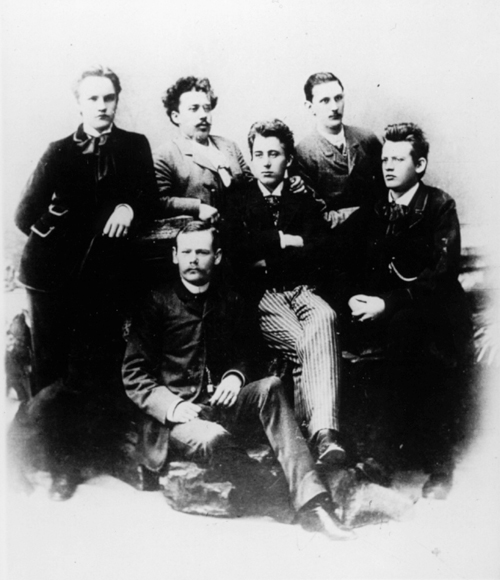 Reger and his fellow students in Wiesbaden (1891), back row: Hans
Schmid, Gustav Cords, Geritt Kreling; front row: Adolf Pochhammer, Georg
Behrmann, Max Reger. Photography, presented to on his birthday on 18 July
1891. – Printed in , p. 104.